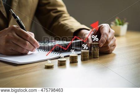 Business Calculates Inflation Red Arrow With A Percentage Sign And A Pile Of Coins, Concept Of Highe