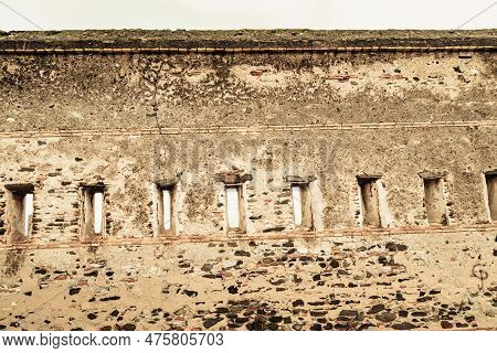 Windows Loopholes In Wall Of Sohail Castle In Fuengirola, Malaga Spain. Tourist Attraction, Place To