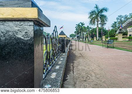 The Benches Along The Path Around The Water Fountain At The Rizal Park In Manila, Philippines