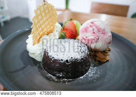 Chocolate Cake Or Chocolate Lava Cake With Ice Cream And Fruit For Serve