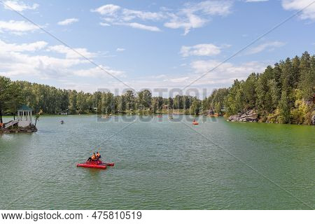 14.08.2022, Altai Republic, Russia. A Small Island On Lake Aya In The Altai Territory Or The Altai R
