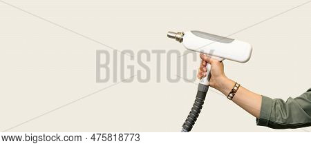 Сosmetologist Holds Hands Maniple For Carbon Peeling And Tattoo Or Permanent Makeup Removal Procedur