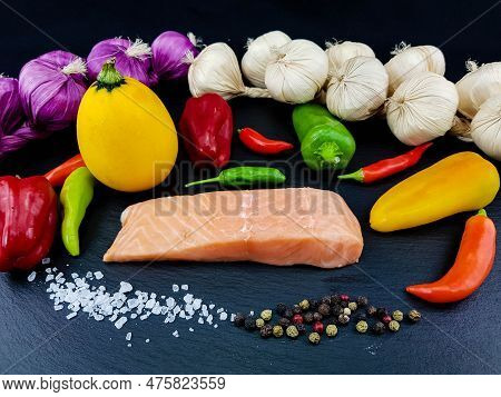 Italian Pappadelle Pasta With A Roasted Salmon Steak And Vegetables