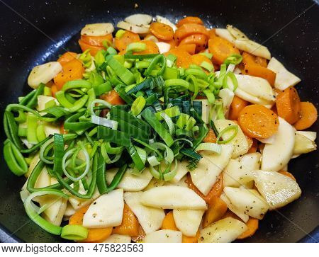 Italian Pappadelle Pasta With A Roasted Salmon Steak And Vegetables