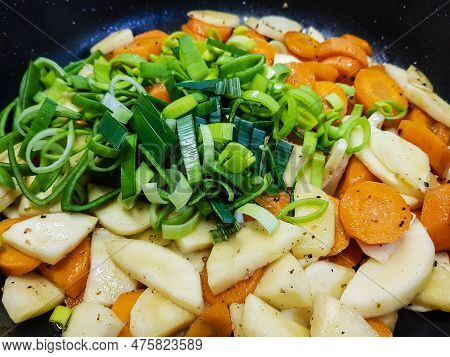 Italian Pappadelle Pasta With A Roasted Salmon Steak And Vegetables
