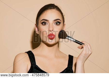 Beauty Portrait Of Beautiful Female Model With Make Up Brush With Powder. Woman With Beauty Face, Na