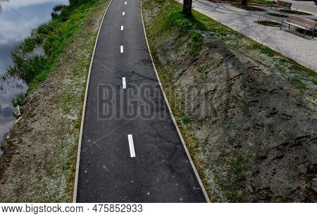 Stabilization Of Slopes By Hydro Sowing. A Mixture Of Wood Pulp And Green Grass Seed Is Sprayed From