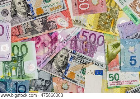 American Dollars, European Euro, Swiss Franc, Canadian Dollar, Australian Dollar Bills
