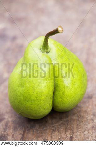 A Pear Looks Like A Botty, Cellulite Skin Or Weight Loss Diet Concept With Copy Space