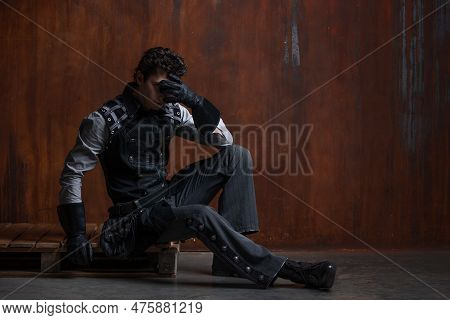 A Young Man In A Victorian-style Suit, A Retro Character. Antihero Or Tragic Character