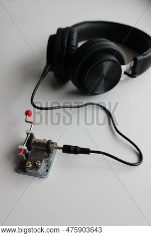 Connection Between Crank Musical Box And Headset Vertical Stock Photo