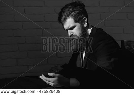 Portrait Of A Teacher Or Professor At Classroom. Satisfied Serious Mature Teacher. Mature Professor,