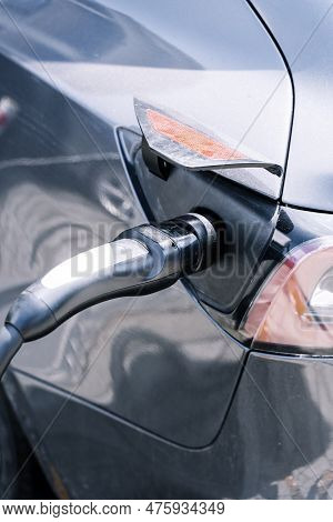 Charging Station For Electric Cars. Types And Connectors Of Ports For Charging Vehicles.