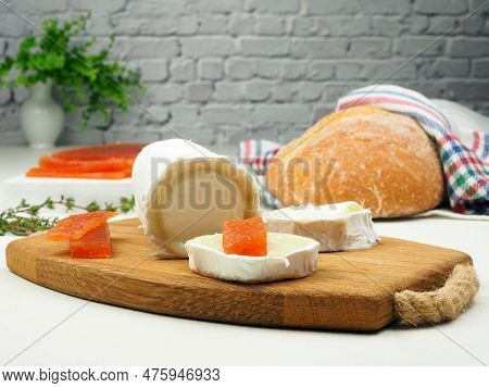 Quince Jelly And Goat Cheese On The Wooden Board. Spanish Cuisine Tapas Ration Con 