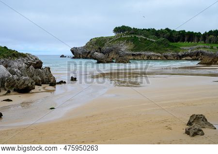 View On Playa De Palombina Las Camaras In Celorio, Green Coast Of Asturias, North Spain With Sandy B