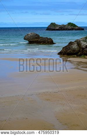 View On Playa De Palombina Las Camaras In Celorio, Green Coast Of Asturias, North Spain With Sandy B