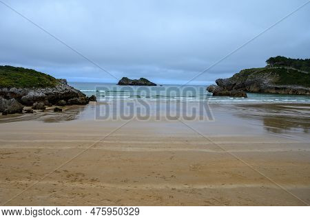 View On Playa De Palombina Las Camaras In Celorio, Green Coast Of Asturias, North Spain With Sandy B