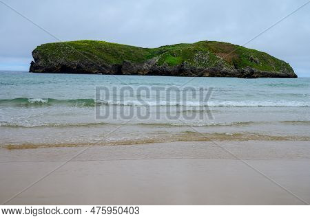 View On Playa De Borizo In Celorio, Green Coast Of Asturias, North Spain With Sandy Beaches, Cliffs,