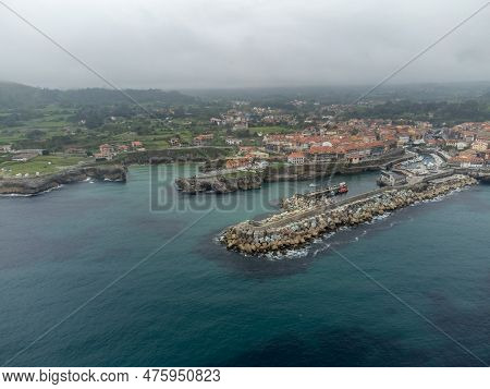 Aerial View On Playa De Toro And Old Harbour Of Llanes, Green Coast Of Asturias, North Spain With Sa