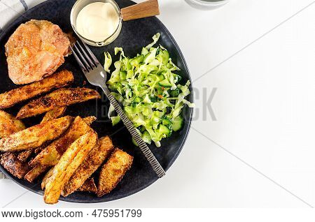 Fried Chiken Meat With Baked Potatoes In Spices And Salad On Plate For Tasty Lunch. Baked Chiken Wit