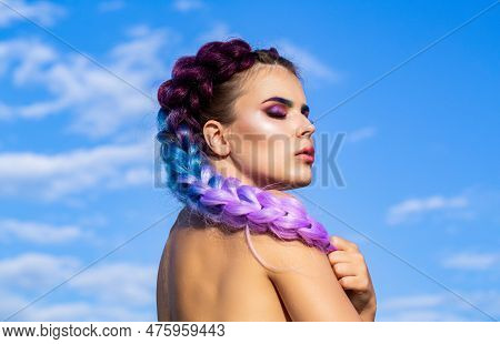 Girl Braids On Background Sky. Bright Makeup, Rose-colored, Braids, Pigtails Hairstyle. Girl With Co