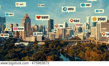 Social Media Icons Fly Over City Downtown Showing People Engagement Connection Through Social Networ