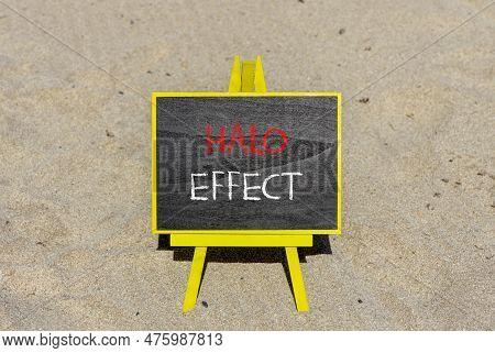 Halo Effect And Psychological Symbol. Concept Words Halo Effect On Beautiful Black Chalk Blackboard 