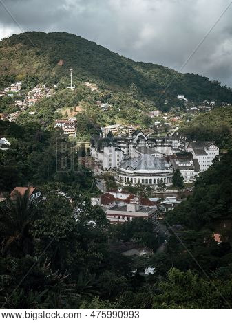 Stunning View Of Quitandinha Palace Surrounded By Lush Green Mountains