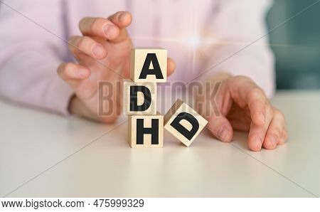 Adhd Word Written On Wood Block. Adhd Text On Table, Concept.