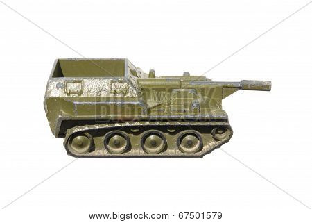 Children's toy: a very old self-propelled Artillery installation of metal green isolated on white ba