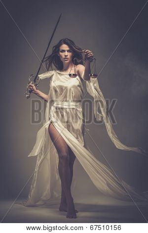 Femida, Goddess of Justice, with scales and sword 