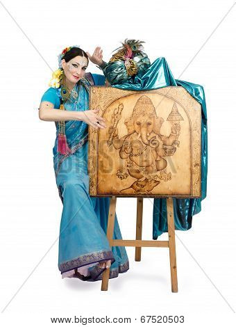 Artist Posing Next To Easel With Pyrography Lord Ganesha