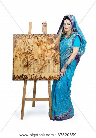 Woman In Indian Turquoise Sari With Pyrography Painting