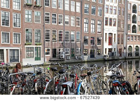 Water canal and typical architecture in city Amsterdam