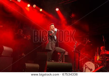 LOULE - JUNE 26: Ala dos Namorados, traditional band from Portugal, performs on stage at festival med, a world music festival, in Loule, Portugal, June 26, 2014 