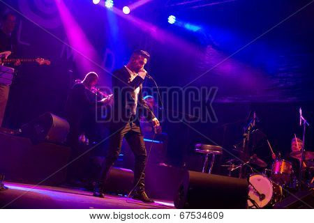 LOULE - JUNE 26: Ala dos Namorados, traditional band from Portugal, performs on stage at festival med, a world music festival, in Loule, Portugal, June 26, 2014 