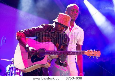 LOULE - JUNE 26: Debademba, traditional band from Mali, performs on stage at festival med, a world music festival, in Loule, Portugal, June 26, 2014 