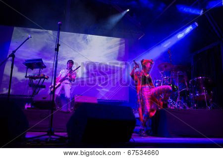 LOULE - JUNE 26: Bomba Estereo an eletronic dance music band from Colombia, performs on stage at festival med, a world music festival, in Loule, Portugal, June 26, 2014  