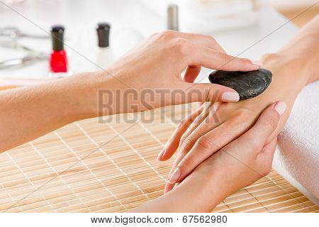 Close up of process of hand massage at beauty salon