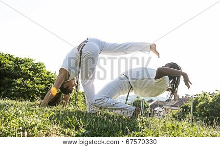 Capoeira couple of awesome stunt outdoors