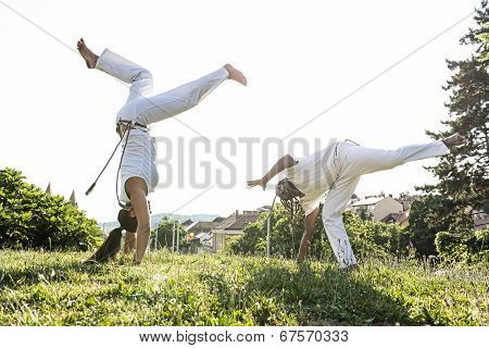 Capoeira couple of awesome stunt outdoors