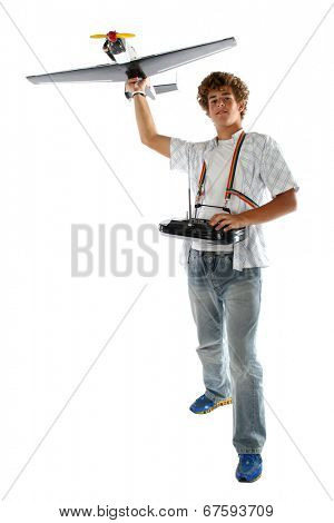 Boy with a model airplane and controls