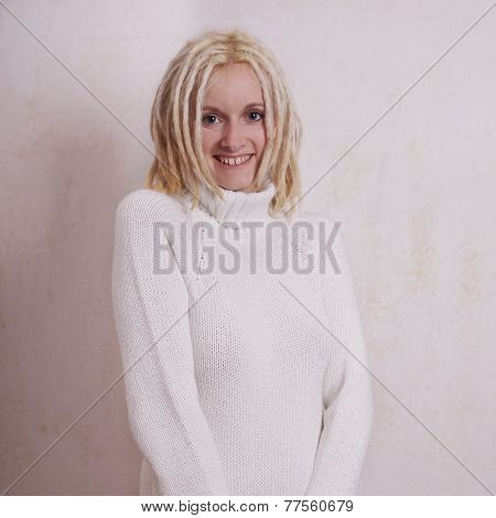 young woman with blonde dreadlocks