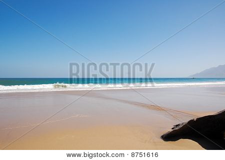 Clean clear beach on a sunny summer day