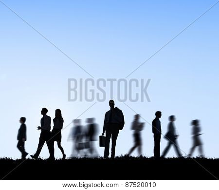 Group of business people in motion.