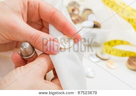 Sewing Button On Cloth