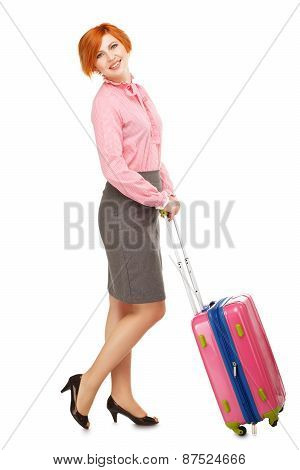 Full Length Portrait Of A Business Woman In Business Trip Standing With A Pink Travel Suitcase