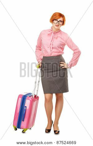 Full Length Portrait Of A Business Woman In Glasses  In Business Trip Standing With A Pink Travel Su