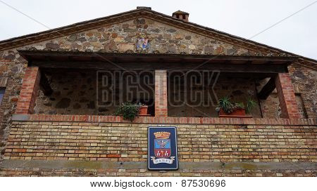 Logo Of Castillo Banfi  On The Wall Of Old Castle...