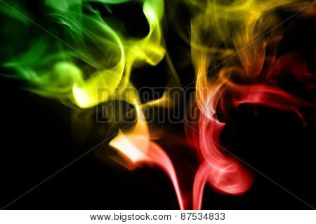 colored smoke on a black background
